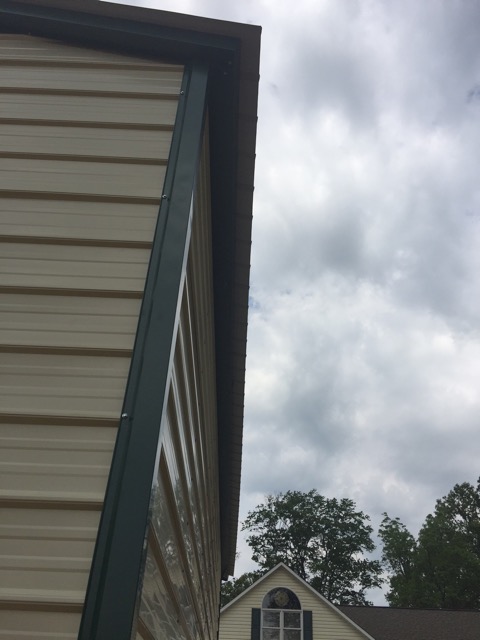 3 Side view of trim on a double wide commercial metal building.