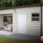 This view shows firewood and electrical work on the side of this metal garage workshop.
