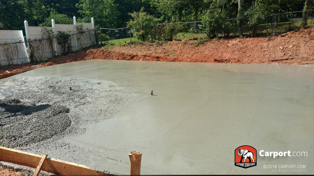 Concrete foundation being poured.