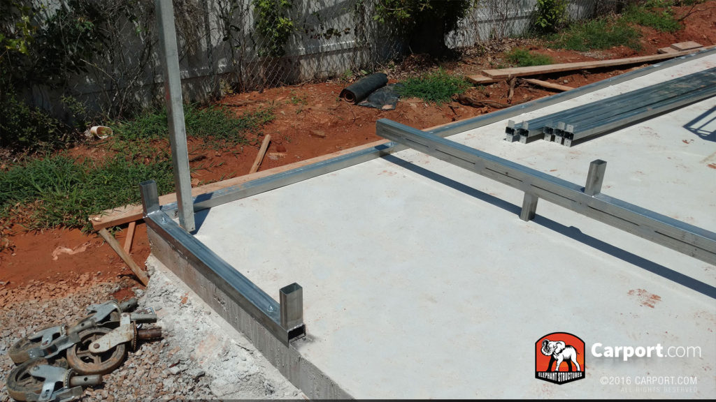 Concrete foundation and the beginning of the frame.