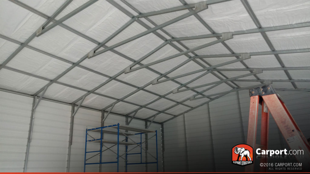 Interior of the garage with framing in view.