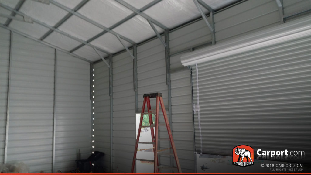 Interior of the garage with walk-in door.