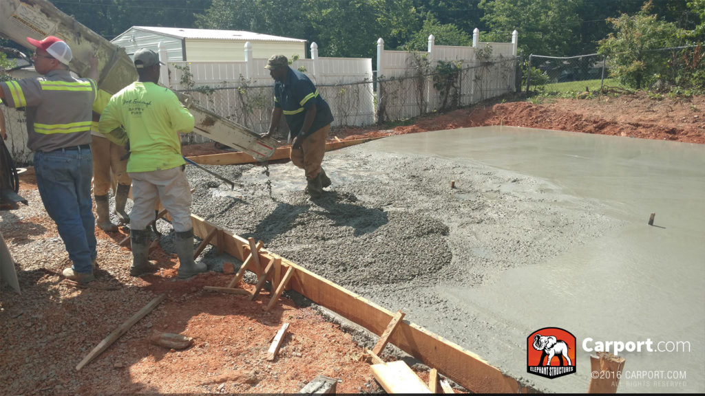 Concrete being poured into the foundation.