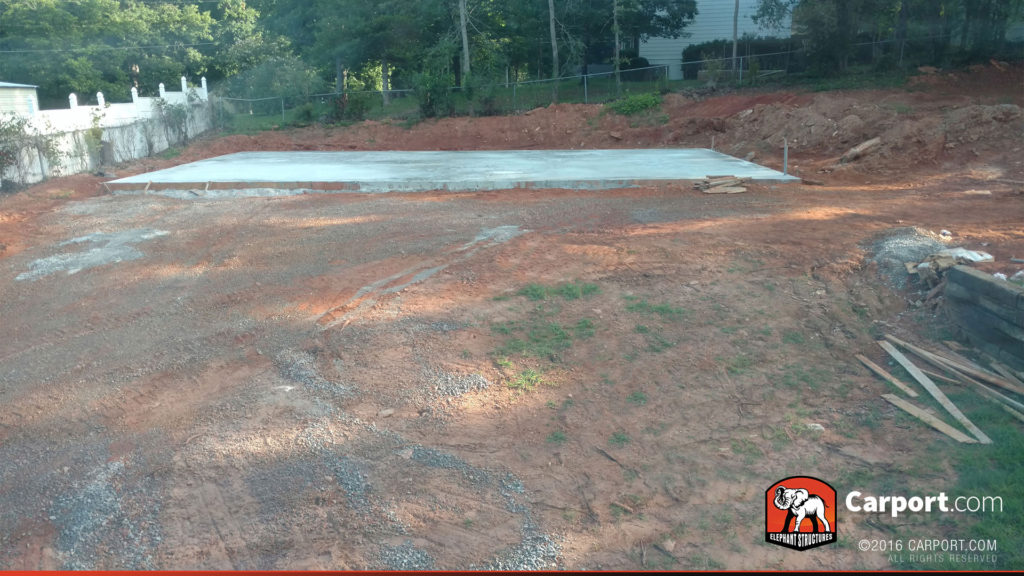 View of the concrete foundation from the driveway.