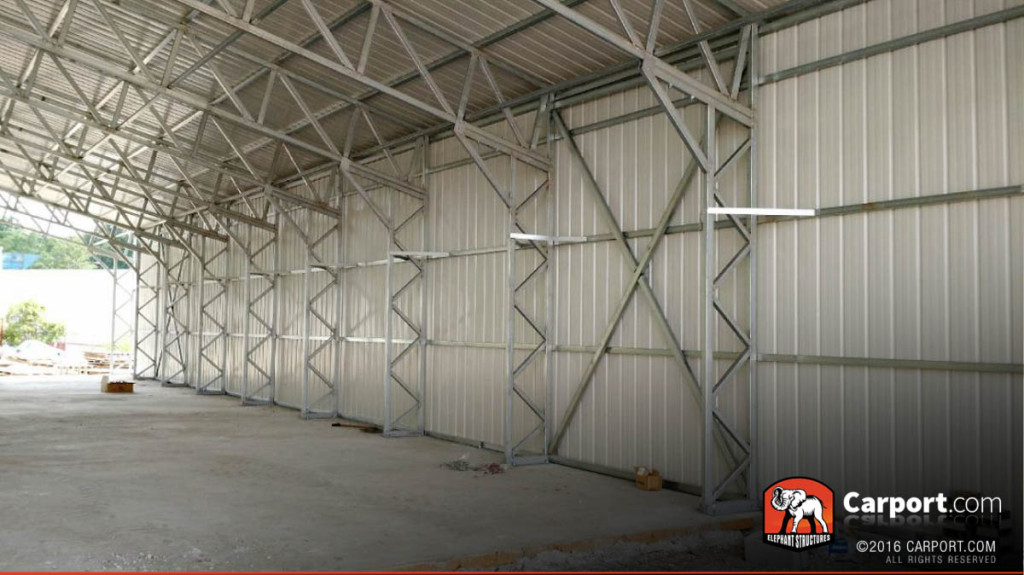 Side view of inside of commercial metal building framing.