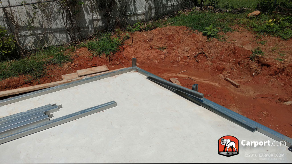 Concrete foundation and the beginning of the frame.