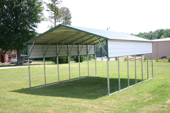 White Metal Patio Cover with green trim and extra panels on the side.