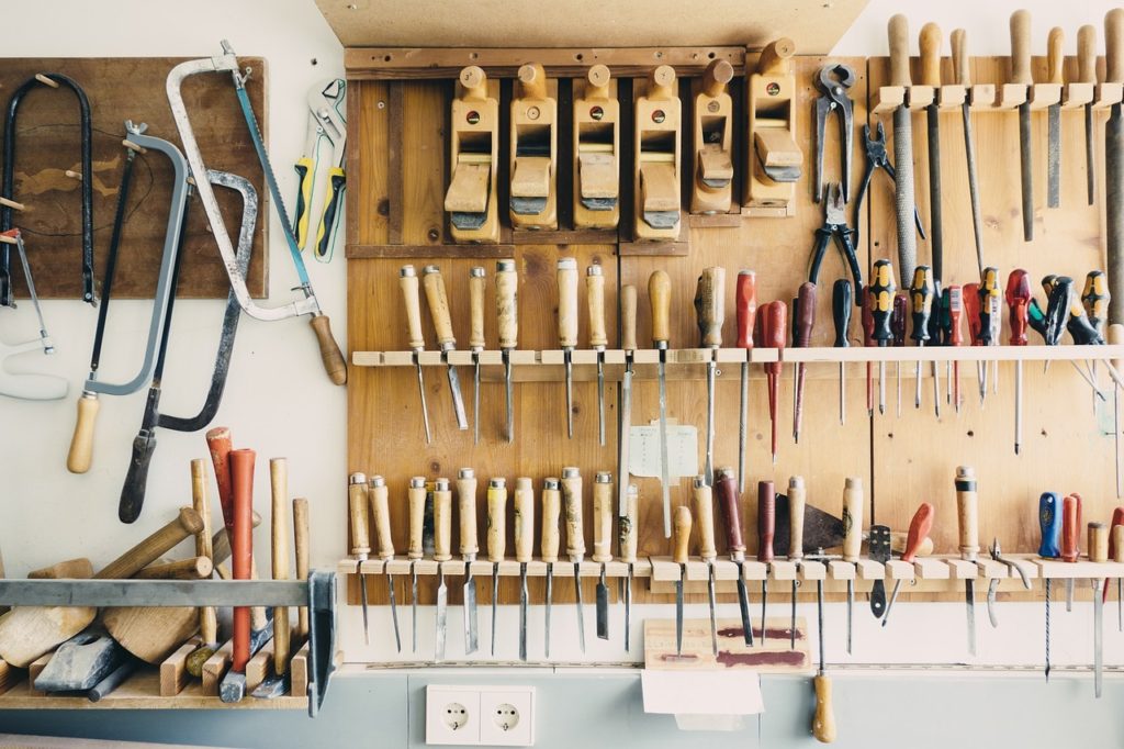 organization on wood shelving in a garage